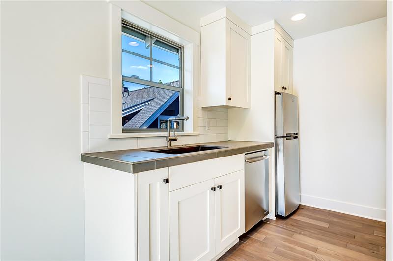 Photo shown is not of subject property. Photo is of a completed unit with a similar floor plan & finishes.
