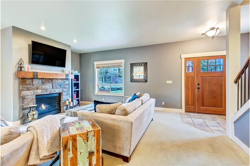 Welcoming entry leads to spacious great room with gas fireplace.