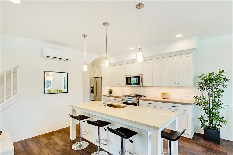 Photos of same finished floor plan with similar finishes. 