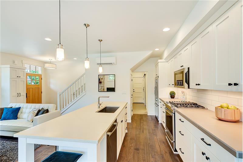 Photos of same finished floor plan with similar finishes. 