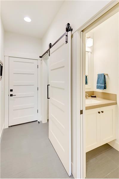 Photos of same finished floor plan with similar finishes. 