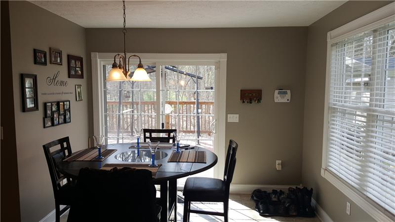 eat-in kitchen w/sliding glass doors to deck