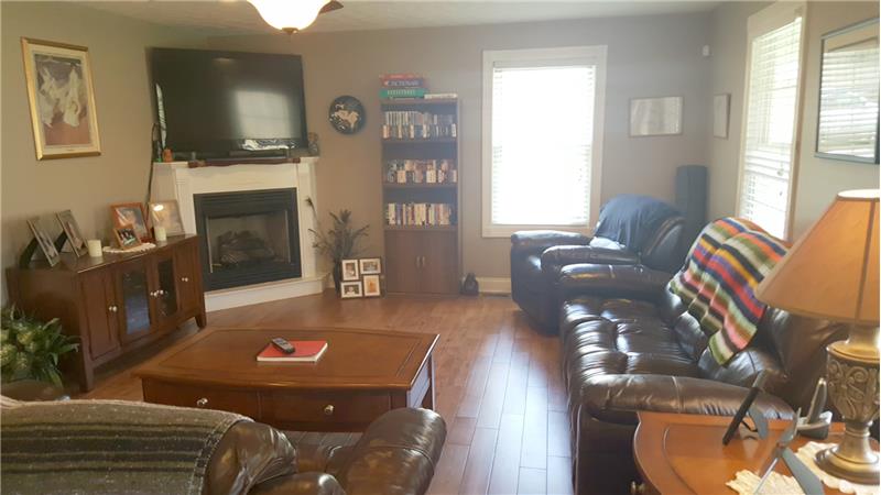 family room with corner gas fireplace