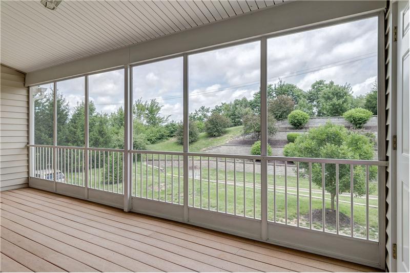 Screened Porch overlooking lovely Gardens