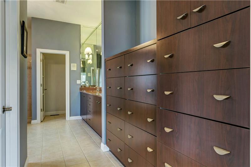 Built-in master dressers and walk-in closet