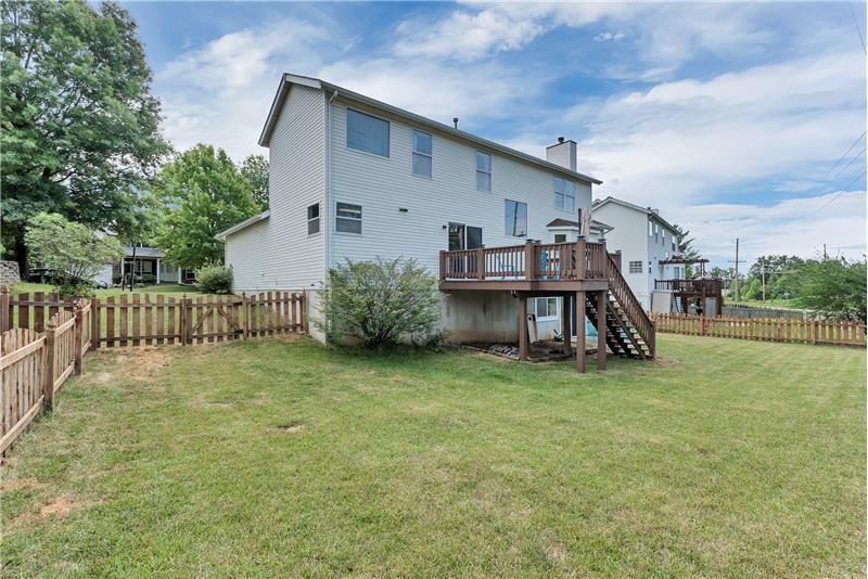 Deck with stairs to the patio and walk-out