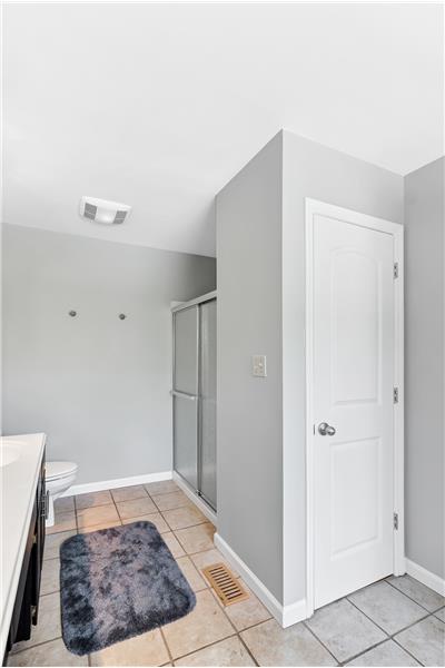 Separate shower and linen closet