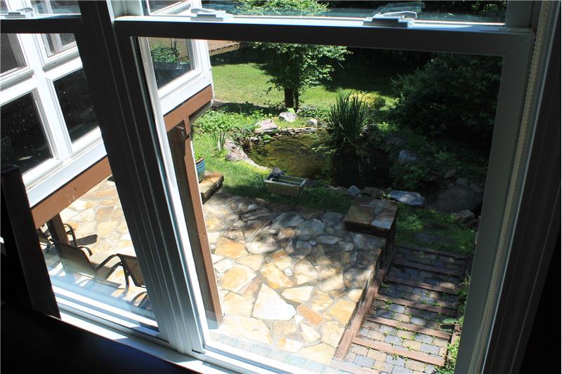 Can view rock paito and Koi pond from Kitchen Table