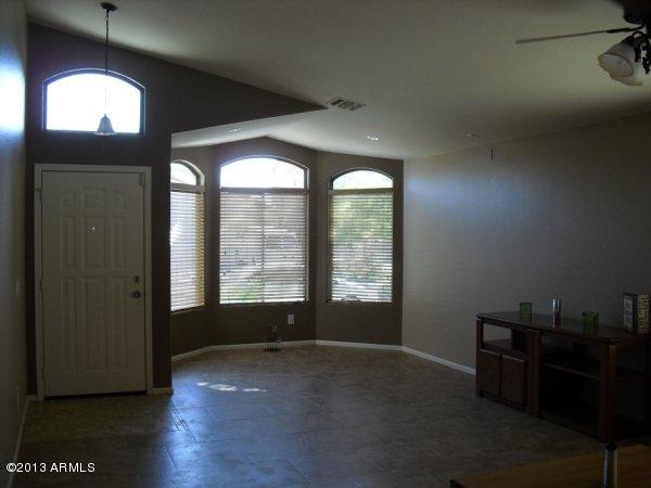 Views of entry, formal living room