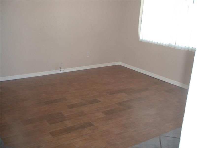 Bedroom-3 wood look tile flooring