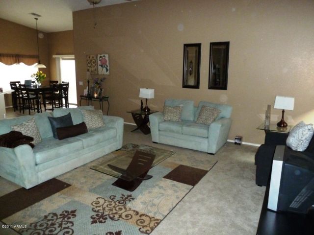 Living room is all tile flooring