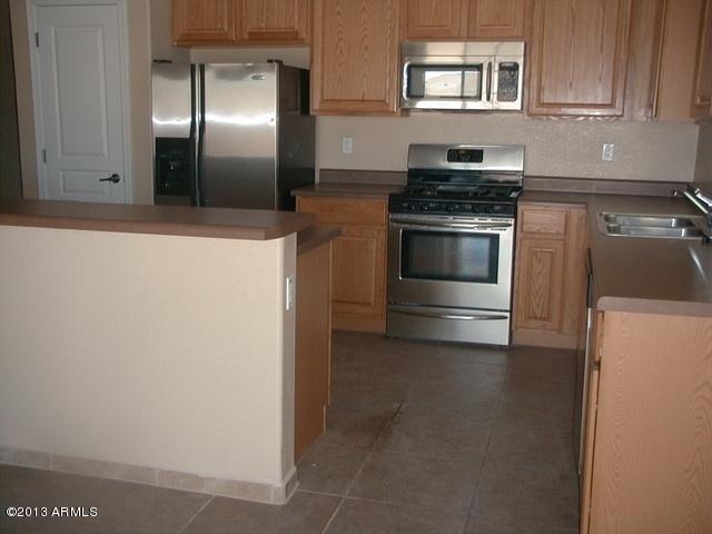 Kitchen cabs have pull-outs + pantry