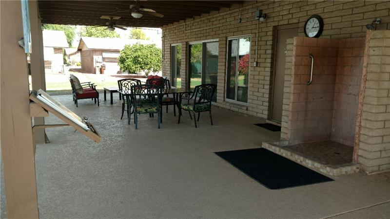 Covered patio off community pool area