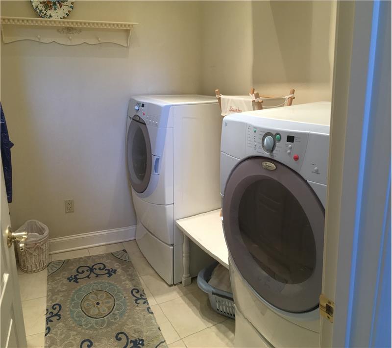 First floor laundry room with closets