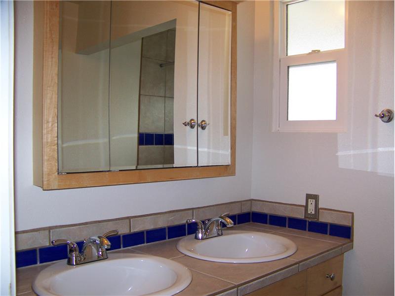 Dual sinks in bathroom.