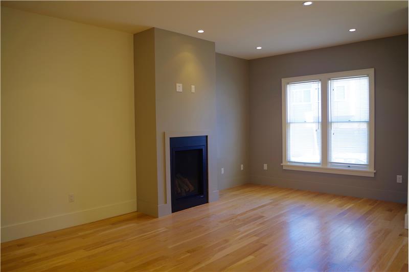 Hardwood floors, natural light and gas fireplace