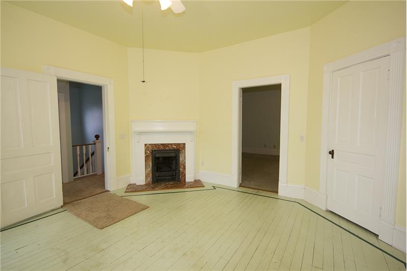 Bedroom with fireplace