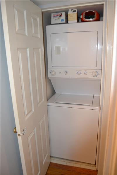 Laundry located in hallway not kitchen like other units in the community