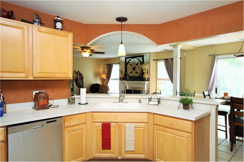 Open concept, stainless steel appliances