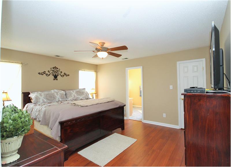 Main floor master suite with 2 walk in closets