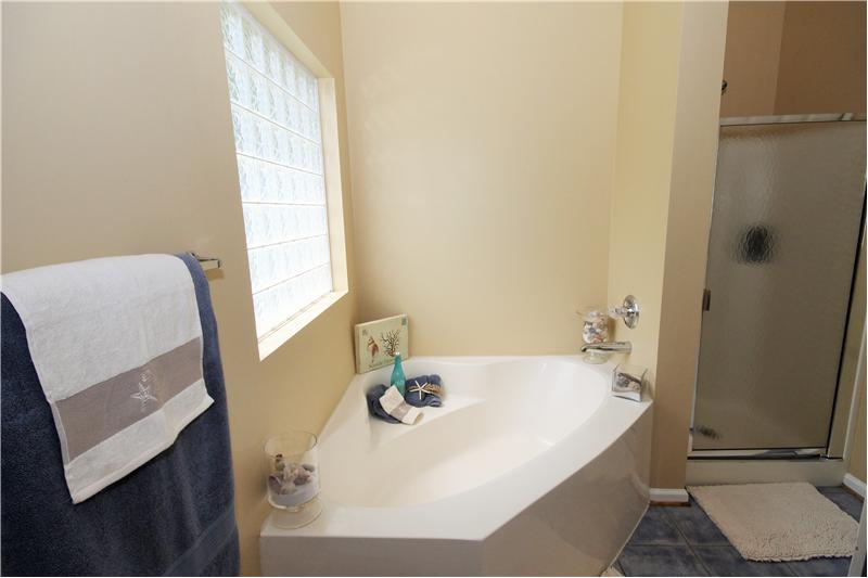 Over sized tub with shower