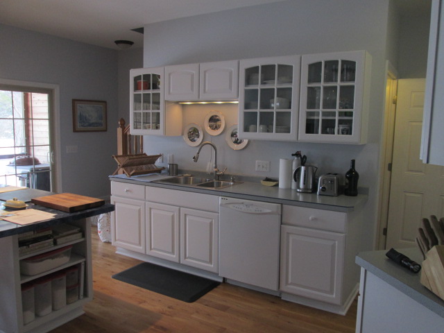 Open and bright white kitchen