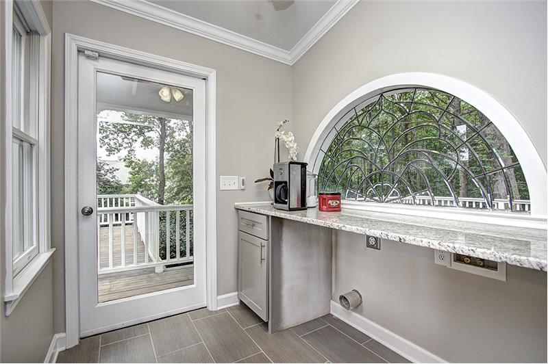 Incredibly spacious Laundry Room offers great views while doing the laundry