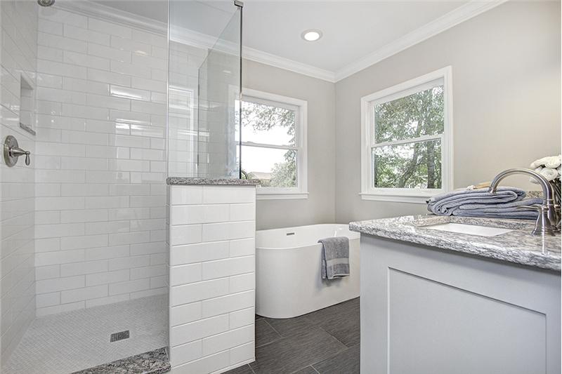 2nd master bathroom also has granite counter tops, dual sinks, deep, luxurious, free-standing tub & enclosed shower