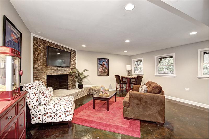 Basement has a living area or bedroom & wood burning fireplace