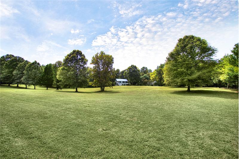 This exquisite estate is situated on 7.5 wood acres that are flat, fully fenced (new fencing) and oh-so serene.