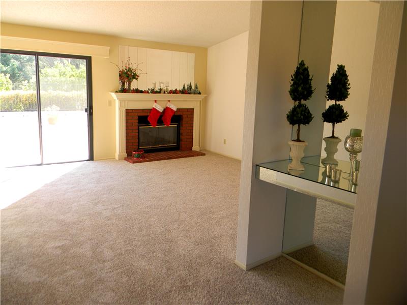 Beautiful wood burning brick fireplace with full mantel