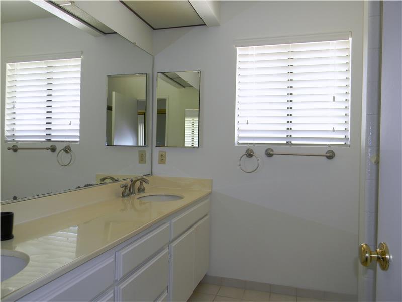 The master bathroom also has dual sinks