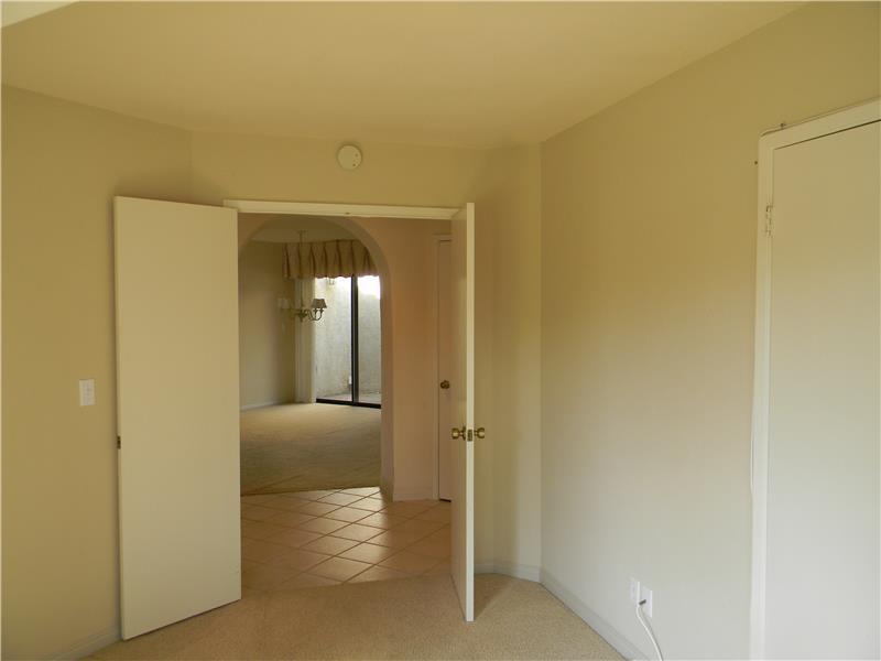 Front bedroom has double door entry