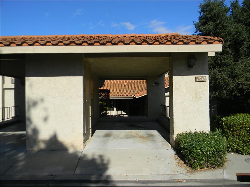 Carport with 2 storage areas