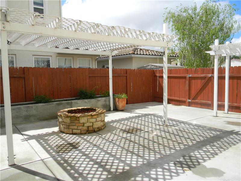 Backyard with 2 arbors