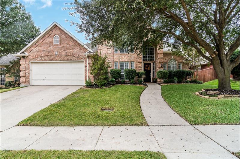 Welcome home to 228 Prism Lane in McKinney!