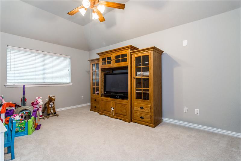 Upstairs game room has plenty of space for media or toys!