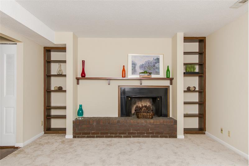 Wood Burining Fire Place Built in Book Cases