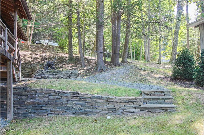 Rock Wall and Steps Side House