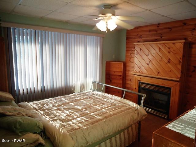 bedroom with fireplace