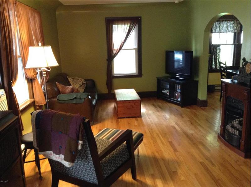 Living Room with Natural Gas Stove