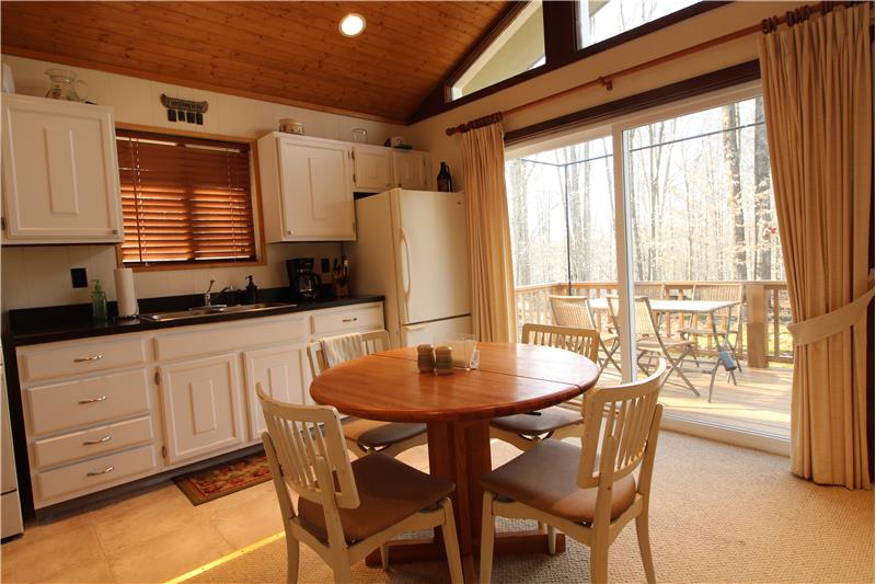 Kitchen with Sliders to Deck