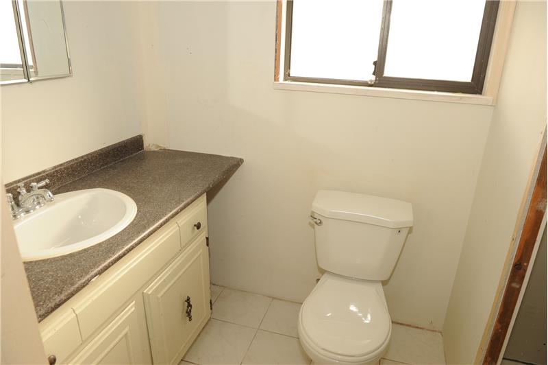 2pc bathroom in basement with rough In shower