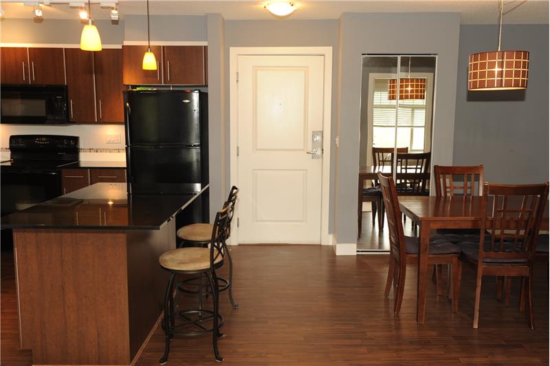 Kitchen and eating area have laminate floors