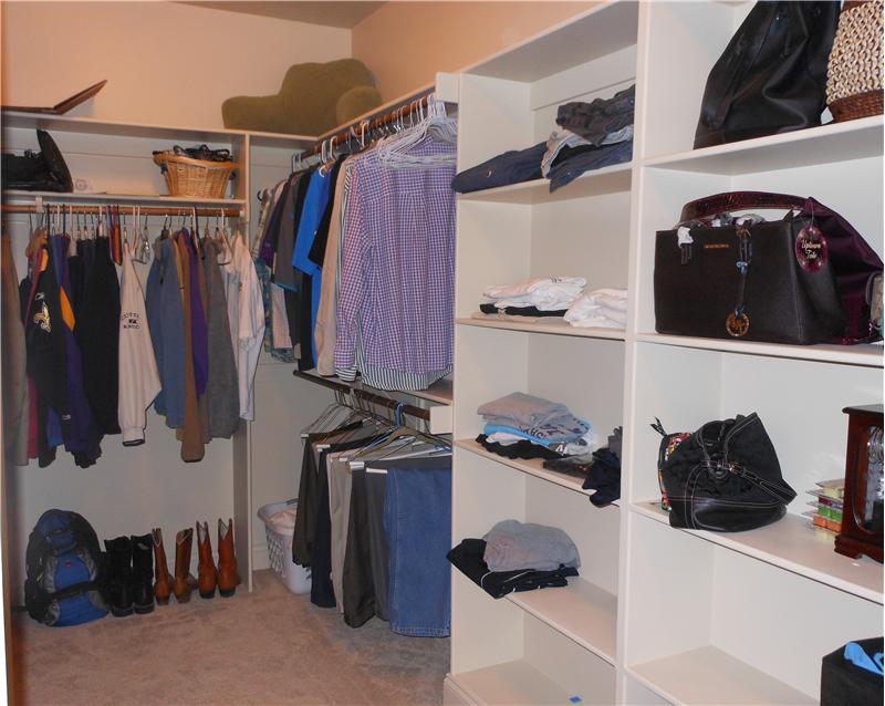 LOTS OF BUILT IN SHELVING IN THE CLOSET