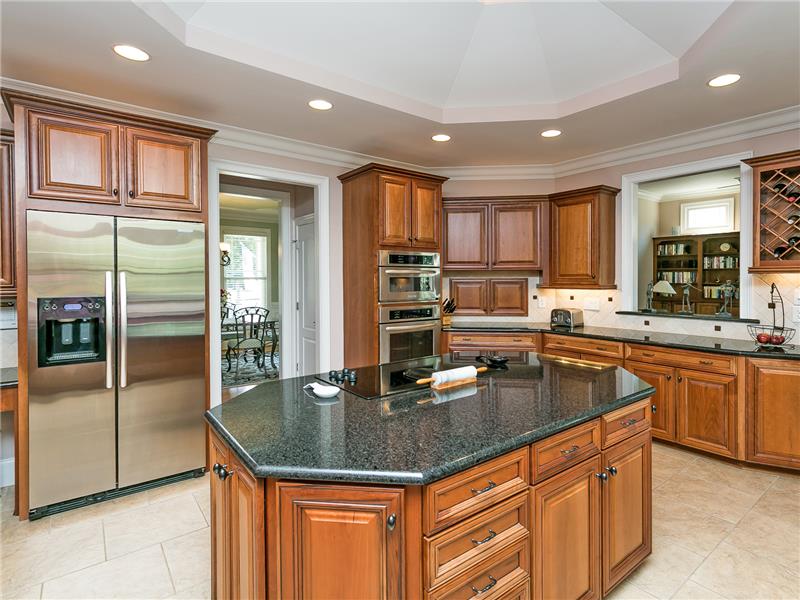 Granite Counters, Tile Backsplash, Stainless Appliances and Walk-In Pantry