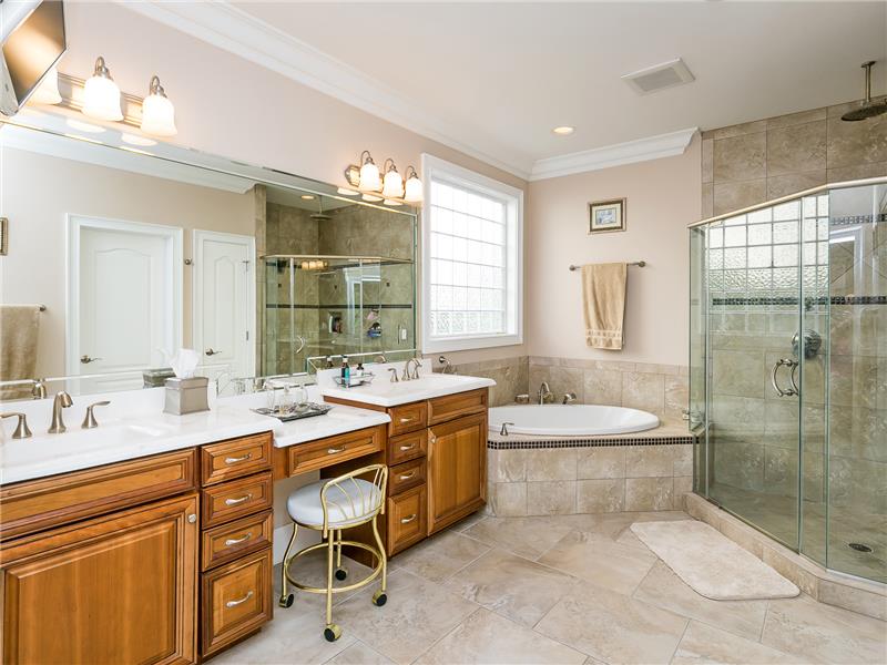 Master Bath offers Dual Sink Vanity and Whirlpool Tub