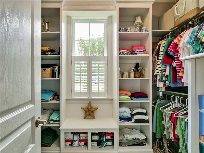 BUILT IN SHELVING IN THE MASTER CLOSET