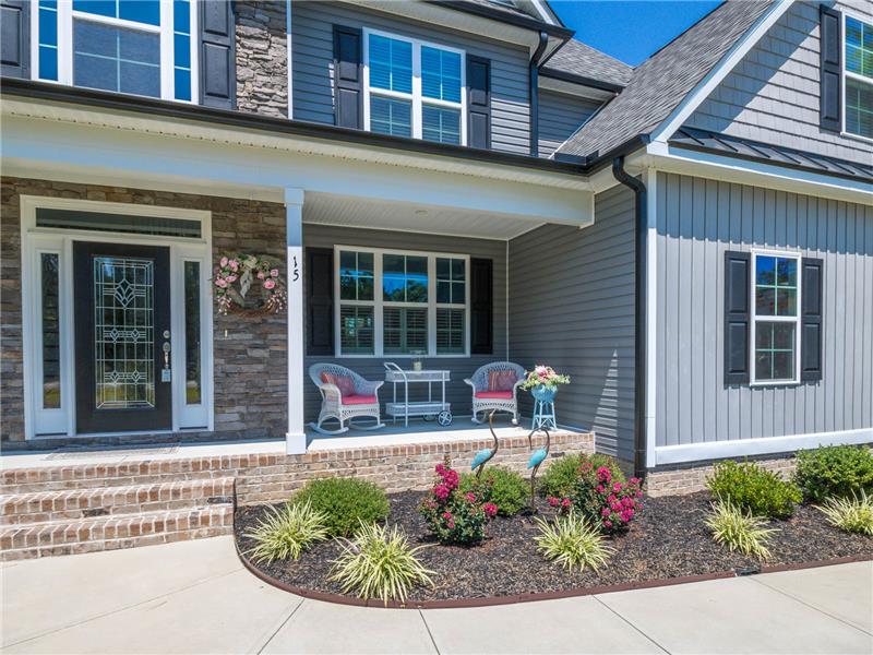 ROCKING CHAIR COVERED FRONT PORCH
