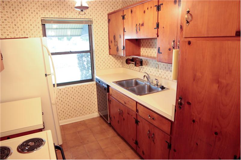 Kitchen with real wood cabinets